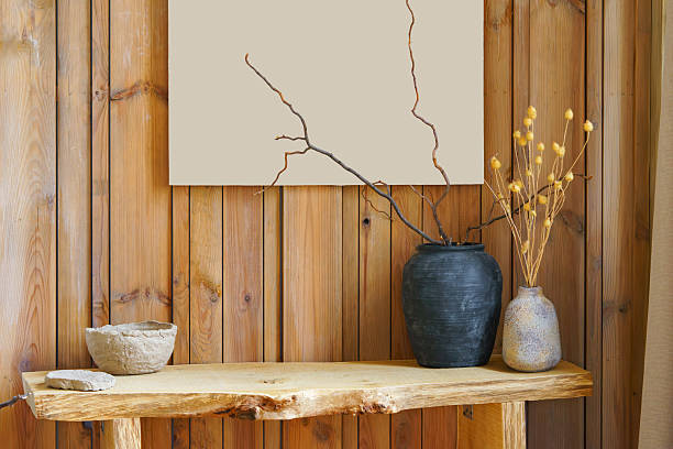 istock Minimal natural decor, ceramic vases and dry branches on  rustic wooden wall background 2244212572