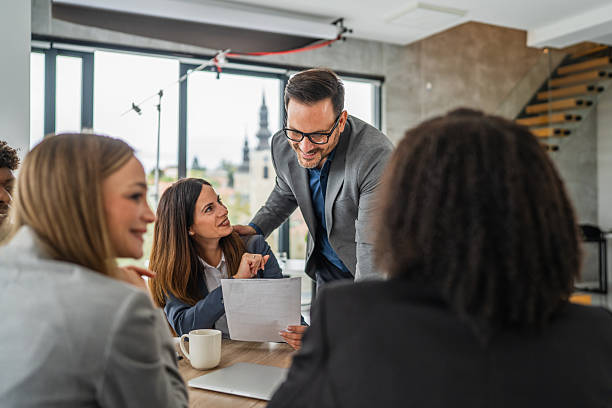 istock Business professionals collaborating at a meeting in modern office 2244214231