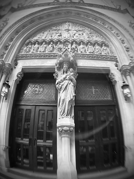 istock NYC B & W church door with Mary 2244214548