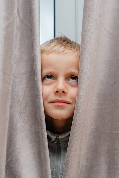 istock Dreamy Child Gaze Upward 2244215642
