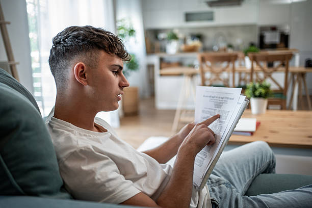 istock Teenager studying at home, learning for school exam 2244216557