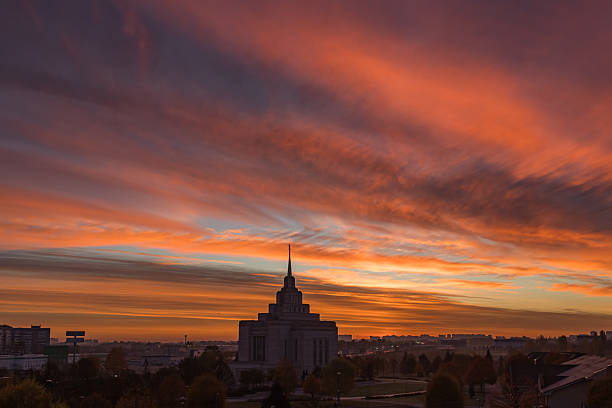 Skyline at sunrise. Colorful dawn. Sky of Ukraine. Mormon Church. European country. Megapolis Kyiv. Panorama of a big city. Sky gradient. Enchanting beauty of nature. Tourism in Europe. Morning over buildings.