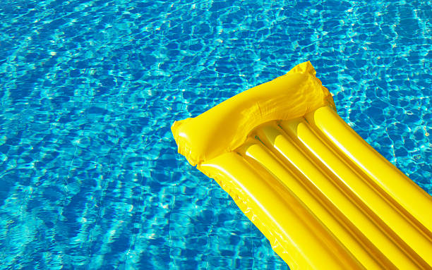 istock Air Yellow Mattress On The Water In The Pool 2244222675