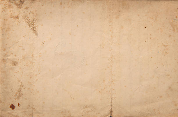 istock Vintage stained paper texture background 2244223730