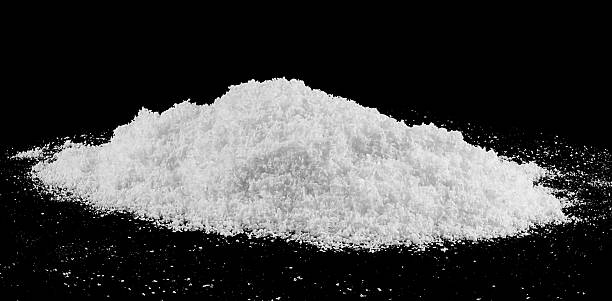 istock Large snow heap, snowdrift isolated on black background, snowy texture. White fluffy snow. 2244224297