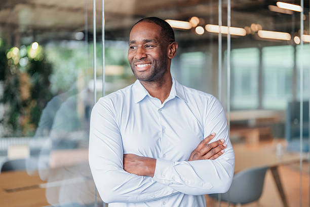 istock Confident business man in modern office 2244226247