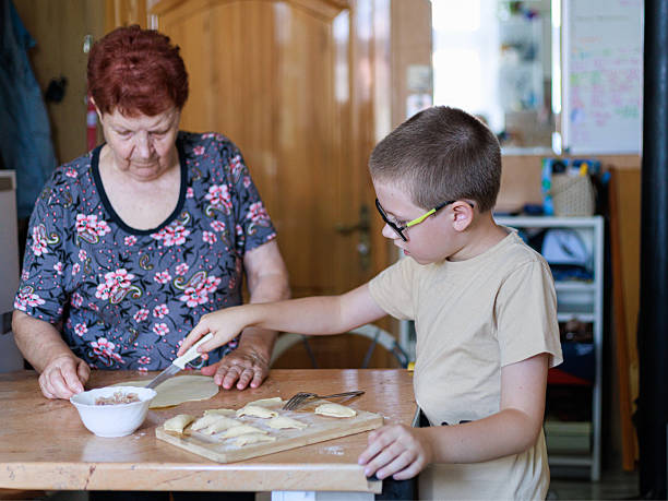 Woman and child preparing dumpling dough at wooden table in kitchen. Perfect for family cooking tutorial, generational bonding content, homemade food tradition blog or culinary education poster template.