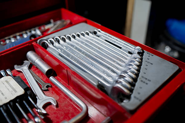 istock Organized mechanic toolset with metal wrenches and sockets in red toolbox representing maintenance, workshop repair and professional hand tool equipment 2244229345