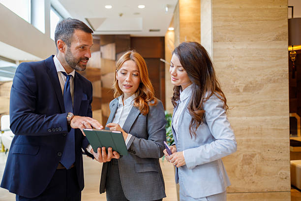 istock Business colleagues collaborating on an important project, using a digital tablet during a corporate meeting 2244230031