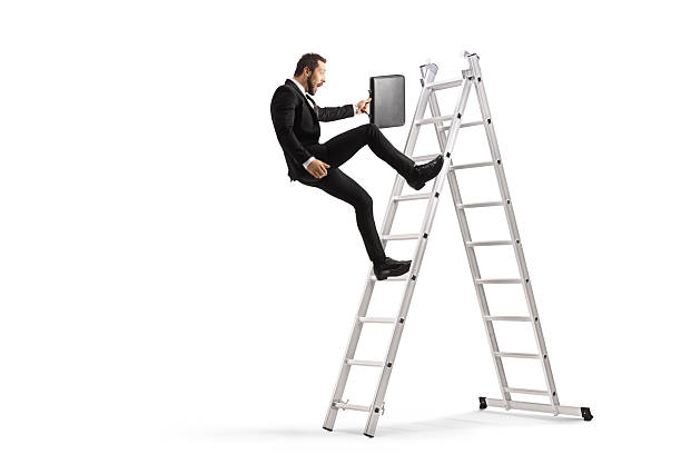 istock Businessman tumbling from a ladder 2244231172