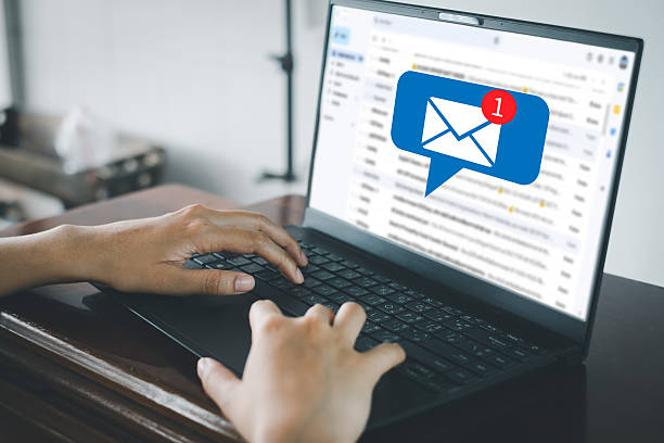 istock Spam Email and Cybersecurity Threat: Laptop with Warning Alert for Phishing or Virus 2244232651