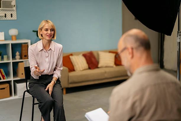 istock Businesswoman talking during interview in a studio 2244236804