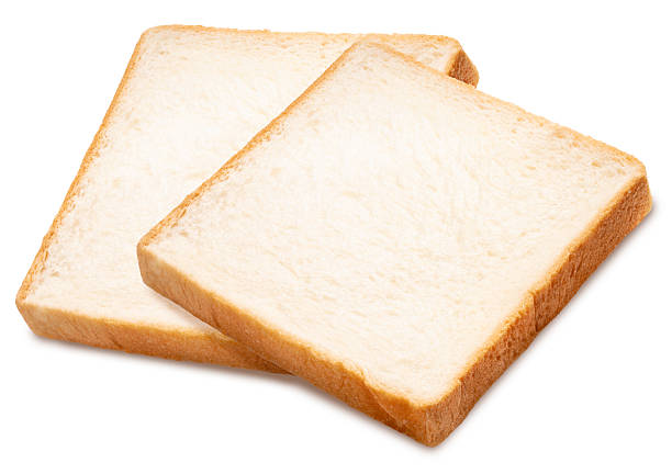 Slice of white  bread isolated on white background, Sliced white sandwich bread on White Background With clipping path, High resolution photography.