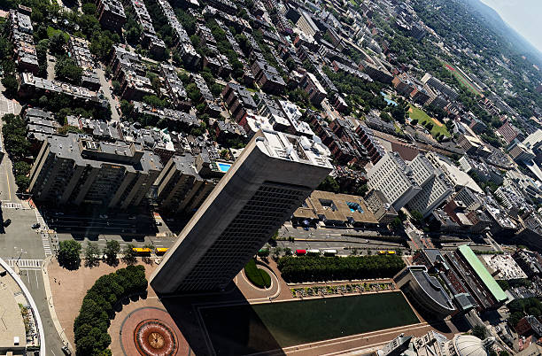 istock Modern Skyscraper with Hollow Center in Bustling Urban Landscape 2244241777