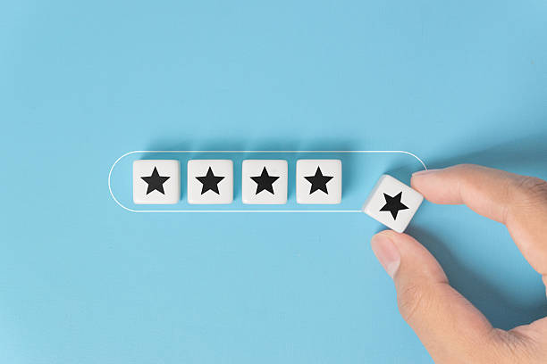 istock Improve rating, increase ranking, improve customer satisfaction concept. Hand putting dice with star icon in progress bar on turquoise background 2244244849