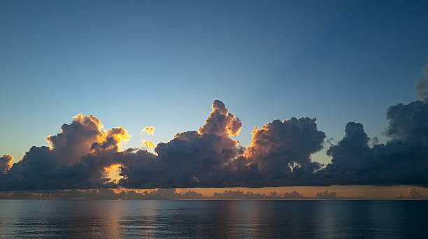 istock Dramatic sunset sky. sea. Calm sea with sunset sky through the clouds over. Sunset ocean and sky background. Tranquil seascape. Horizon over the sunset sea water. Calm sea with sunrise sky. 2244244968