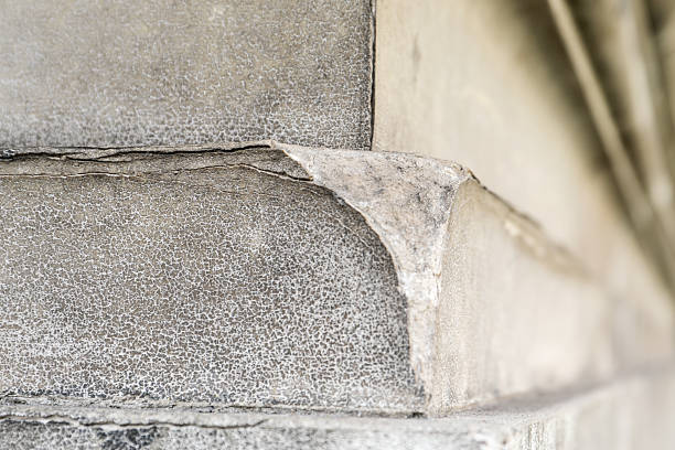 istock Peeling Paint and Cracked Wall Texture Detail. Decay and weathered architectural material 2244254157