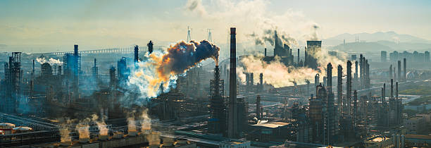 istock Smoke pollution in industrial area 2244254815