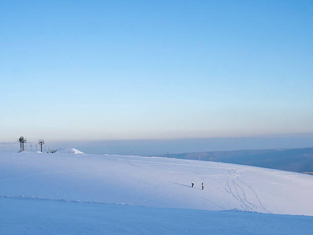 summit of the mountain called La Maliciosa in the Sierra de Guadarrama of Madrid with the communication towers called the Bola del Mundo covered in snow