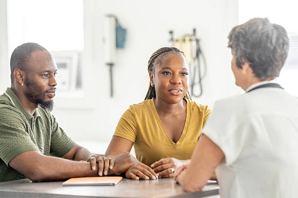 istock Three Diverse Adults Engage in Friendly Medical Consultation in Modern Clinic Setting 2244258505