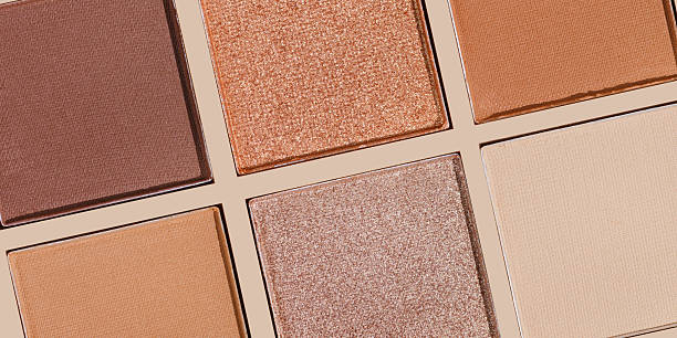 istock Close up texture Swatches eyeshadow refills as minimal graphic pattern. Matte and glitter pans neutral shade, detail texture, natural light, minimal cosmetics background, beauty product, eye makeup 2244262881