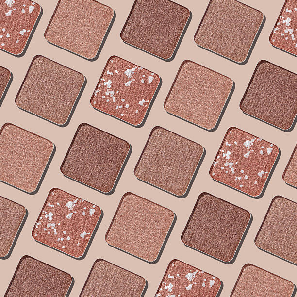 istock Swatches eyeshadow refills as graphic minimal monochrome pattern. Matte and glitter pans beige brown shades, detailed texture, sun light, stylish cosmetics background, beauty product, eye makeup 2244262882