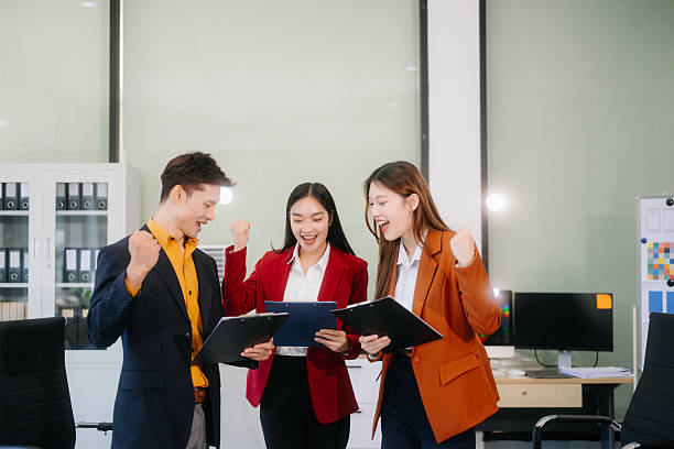 istock Professional teamwork as business colleagues engage in strategy, planning, and discussion 2244263462