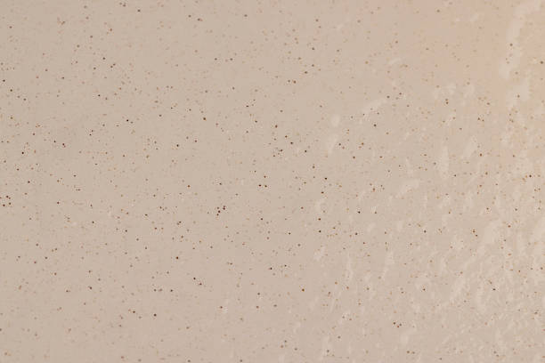 istock wet ceramic bowl with black and other small dots on the surface in water droplets, made of baked clay and painted in light paint wet food bowl 2244265878