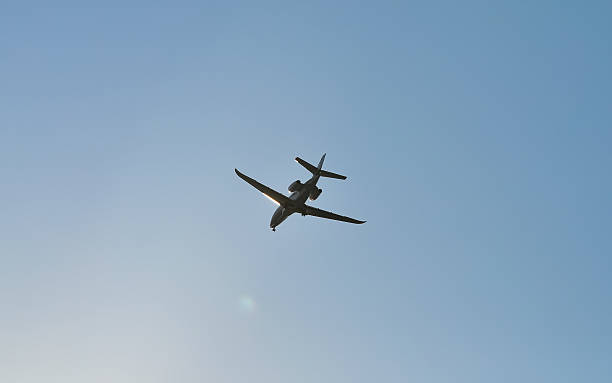 istock small plane flying low in the sky with space for text 2244268851