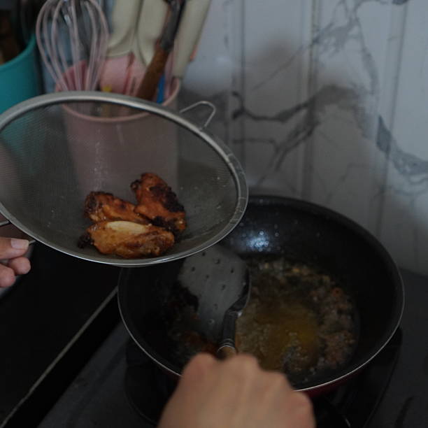 istock A person lifts a perfectly crispy, 2244274496