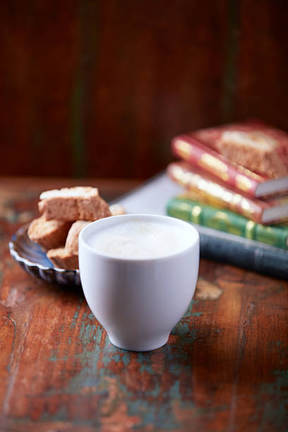 Paris, France: Colorful Cappuccino on Vibrant Sunlit Red Table Close-Up
