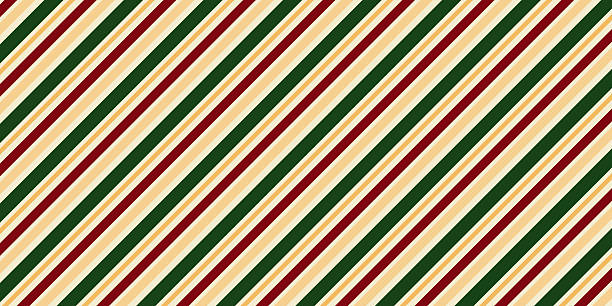 istock A diagonal stripe pattern in traditional Christmas colors. A festive seamless background for the holiday season, gift wrapping, and winter holiday concepts. 2244292595