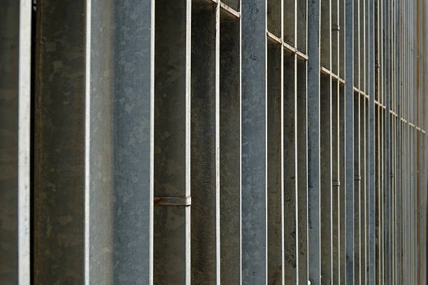 Silver colored metal bars side on