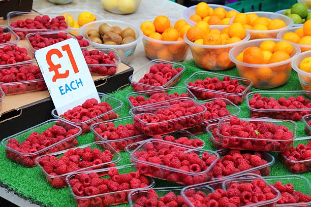 istock Boxed raspberries at a British market 2244293486