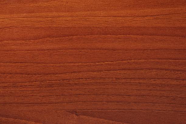 istock Rich mahogany wood texture with smooth grain patterns showcasing natural beauty and warmth 2244294675