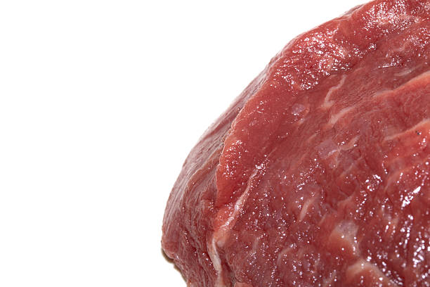 Raw beef steaks on a plate ready to grill outdoors