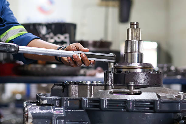 istock Mechanic's hands tightening bolt using a torque wrench 2244296329