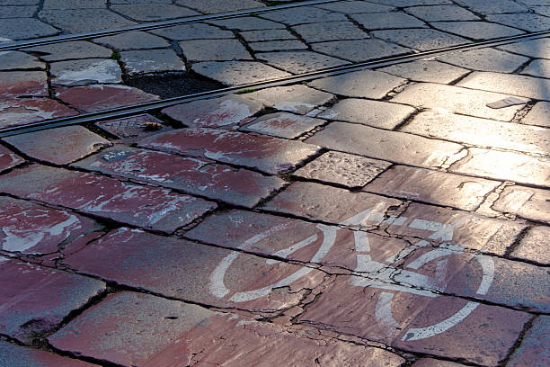 istock Cycle path along corso Sempione in Milan, Italy 2244299540