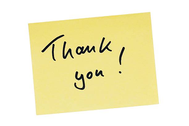 istock handwritten thank you note in black ink on yellow paper 2244310372