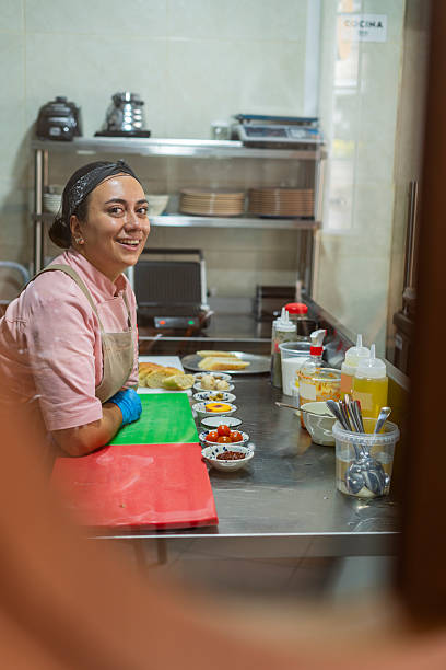 istock Chef prepares a delicious dish to serve at the table in an Italian restaurant, ready to eat, consisting of Milanese chicken, salad, pasta, and a glass of wine. 2244315708