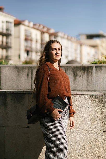 istock Woman walking in a city 2244324888