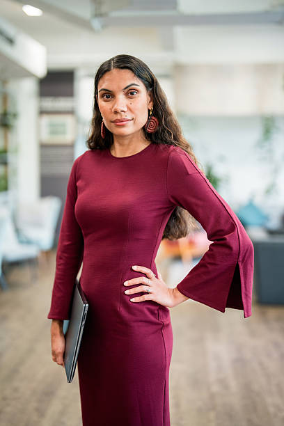 istock Confident Aboriginal Businesswoman Engages in Modern Office Setting 2244326011
