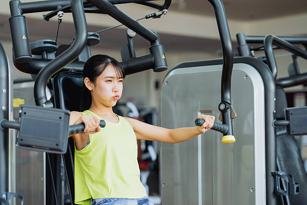 istock Young woman training in the gym 2244326680