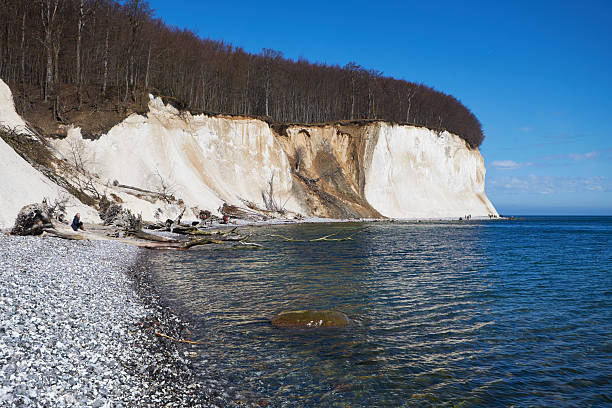Sassnitz, Germany - April 3, 2015: High chalk cliffs at the coast of Rugen island, Jasmund National Park, Mecklenburg-Vorpommern, Germany