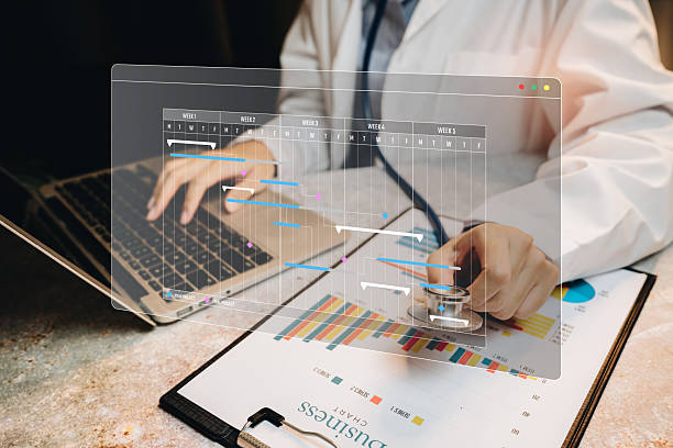istock Doctor using laptop and stethoscope to analyze health data and performance metrics in modern medical office setting 2244331814
