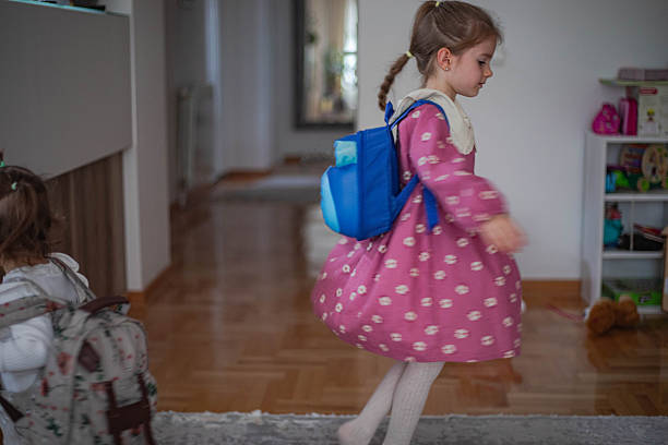 Cheerful girls ready for kindergarten