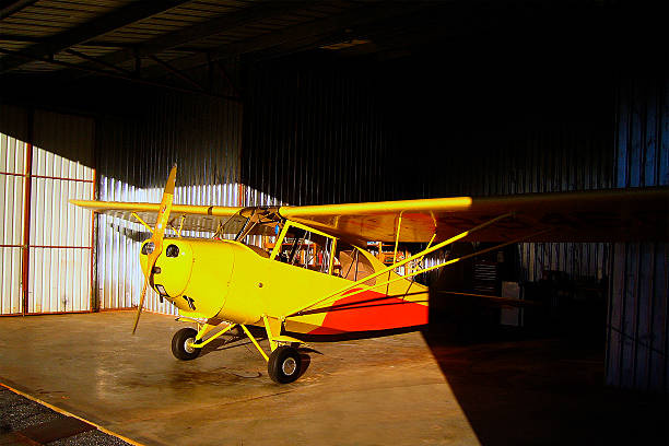 bright yellow 1946 airplane -- Aeronca-7AC