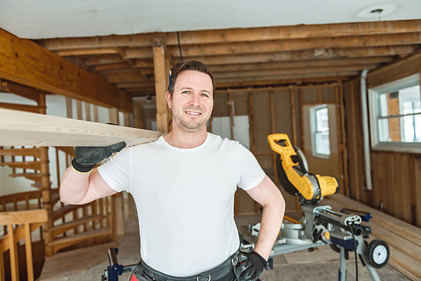 A Carpenter working in an old house