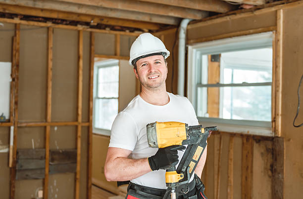 istock Carpenter men working in an old house 2244340502