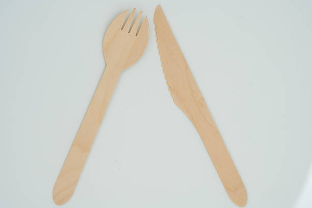 istock Eco-Friendly Wooden Knife and Fork Isolated on White Background 2244340892